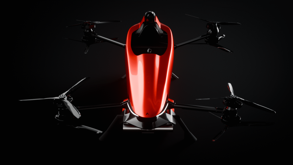 Top-down view of a red hexacopter drone with six rotors against a black background, showcasing its sleek, futuristic design.